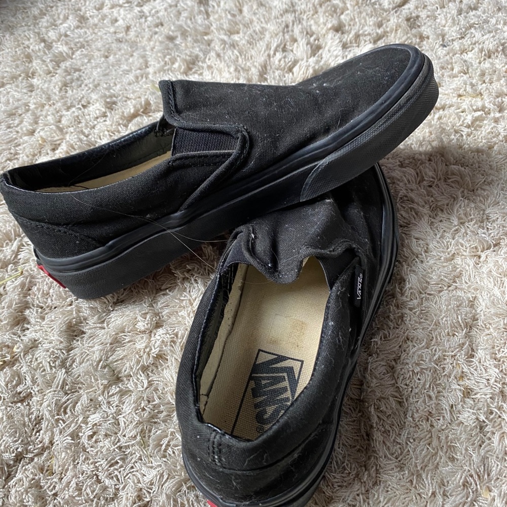 Black slip on Vans